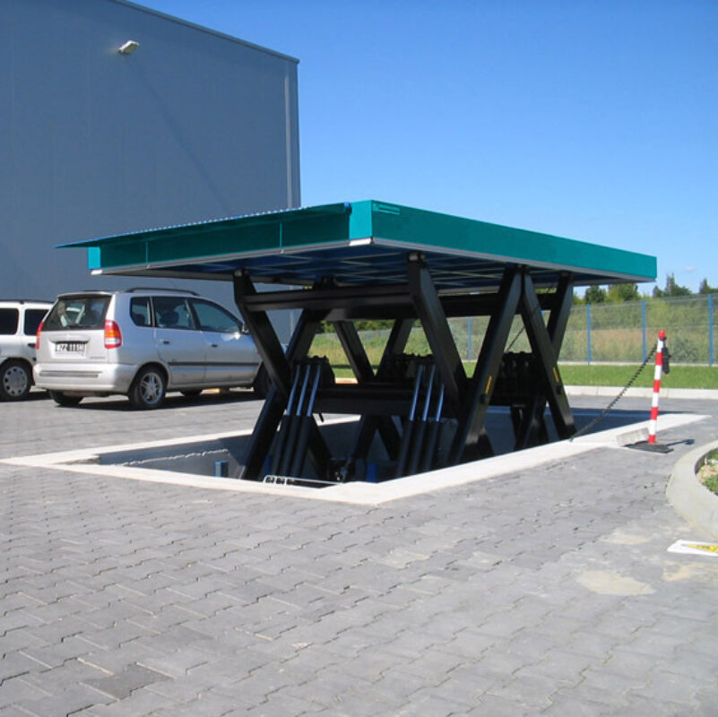 Table élévatrice d’une capacité de 10000 kg montée en fosse pour usage extérieur